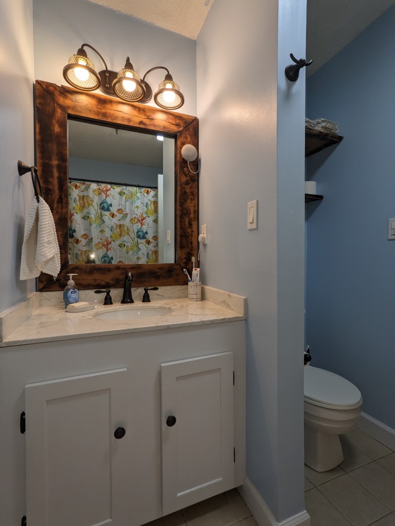 BLUE-BATHROOM-FINISHED REMODELING A BATHROOM (2)