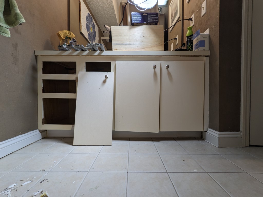 OLD-VANITY-DOORS-AND-EMPTY-DRAWERS REMODELING A BATHROOM (3)